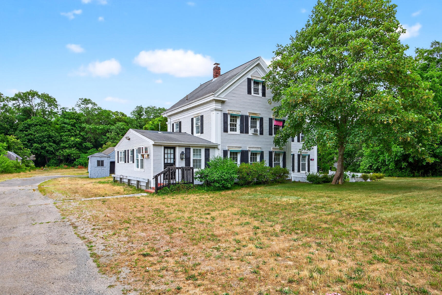 216 Main Street Orleans, MA 02653 - Photo 33 of 51 a house view with a garden space