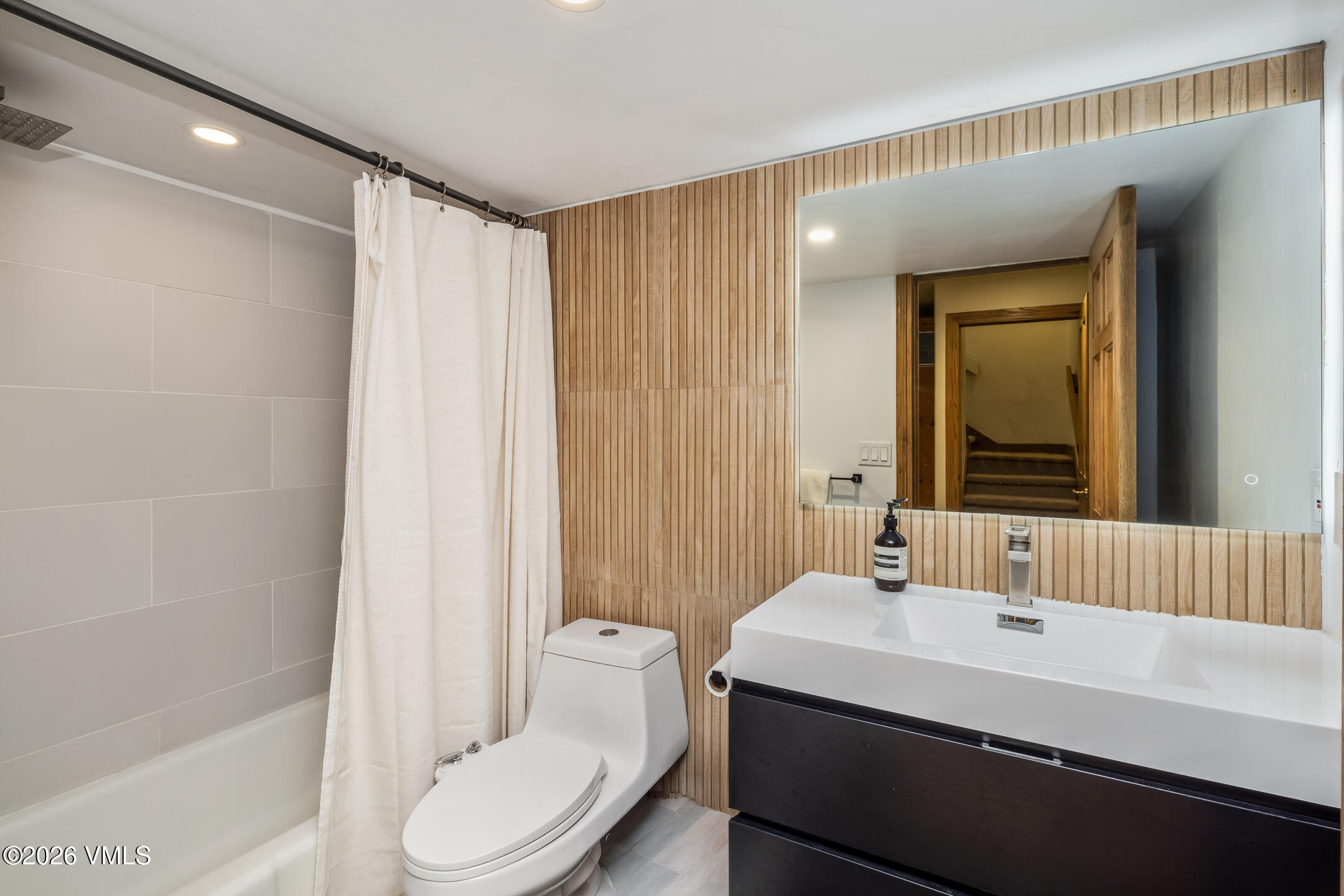 321 Meile Lane Edwards, CO 81632 - Photo 23 of 44 a bathroom with a sink a toilet and shower