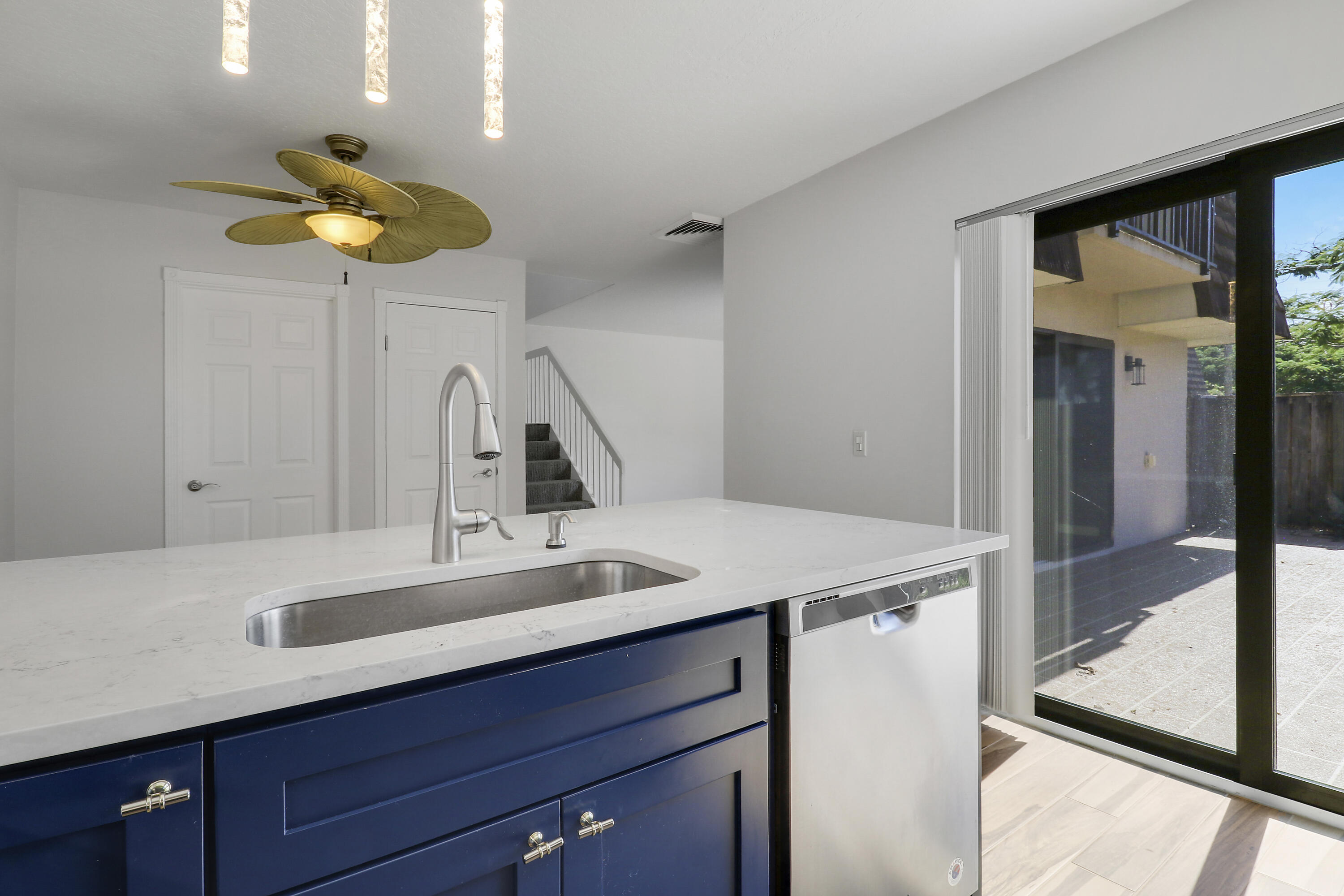 2324 23rd Court, Unit 55D Jupiter, FL 33477 - Photo 9 of 41 a bathroom with a sink and a mirror