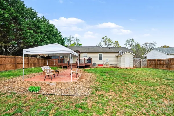 a front view of house with yard and seating area