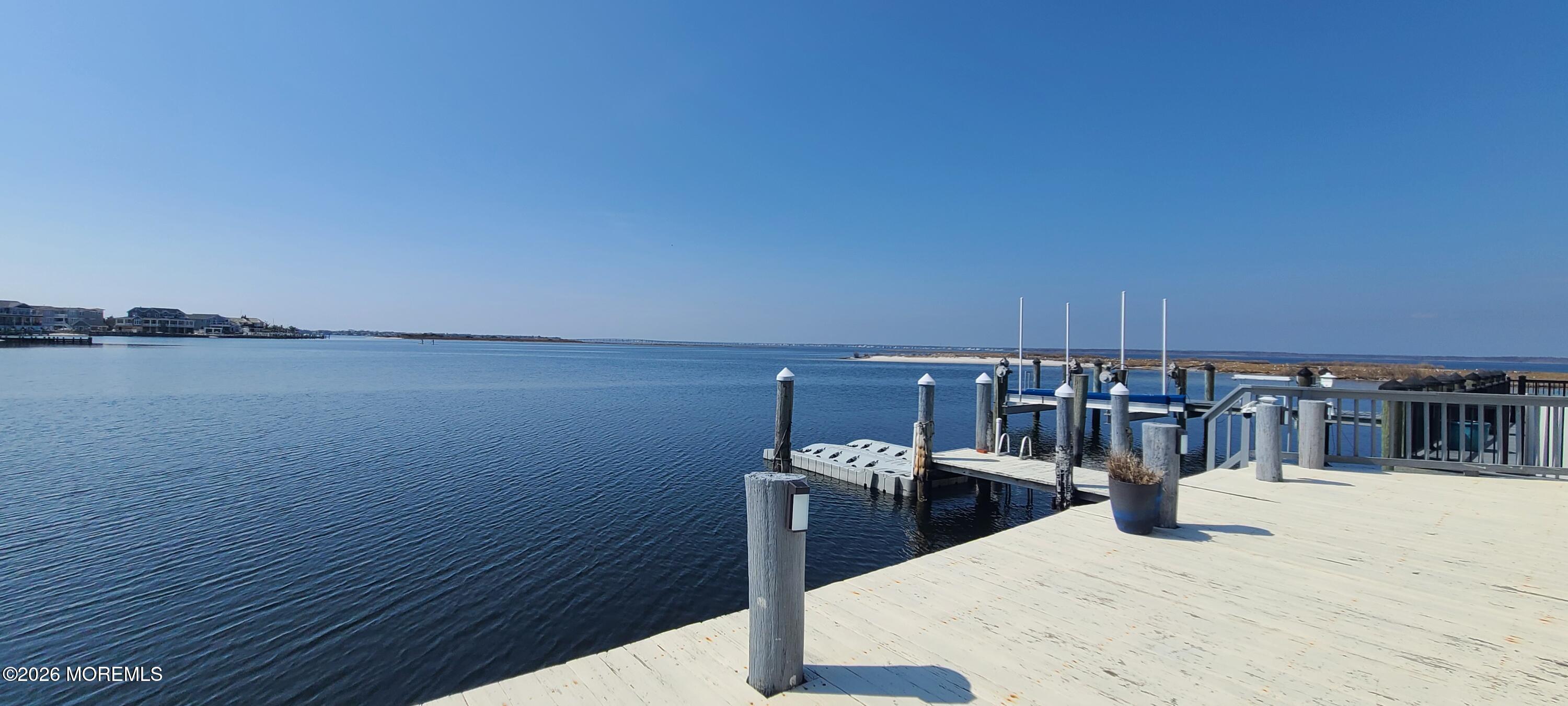 a view of a balcony with two chairs