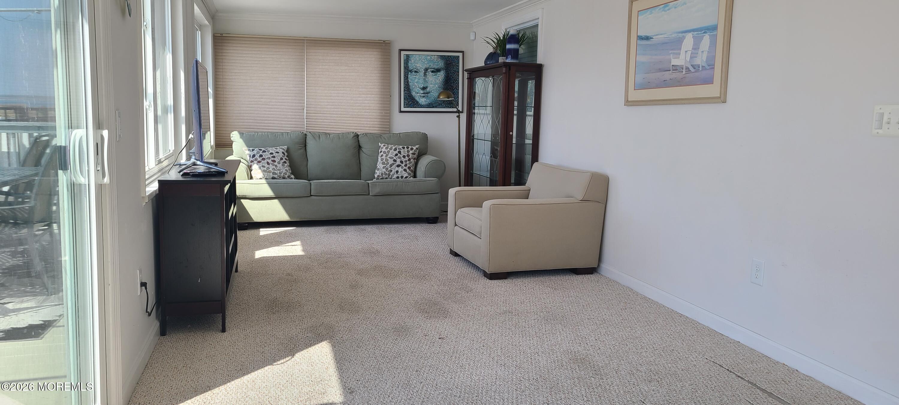 259 Joseph Street Lavallette, NJ 08735 - Photo 12 of 26 a living room with furniture and a window