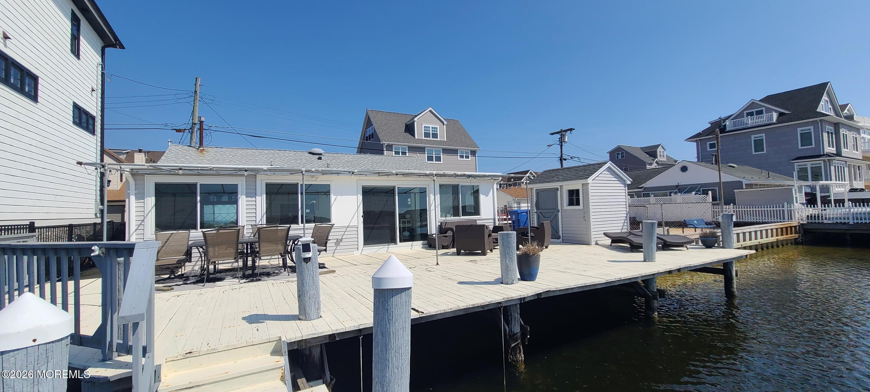 259 Joseph Street Lavallette, NJ 08735 - Photo 26 of 26 a view of a house with swimming pool and sitting area