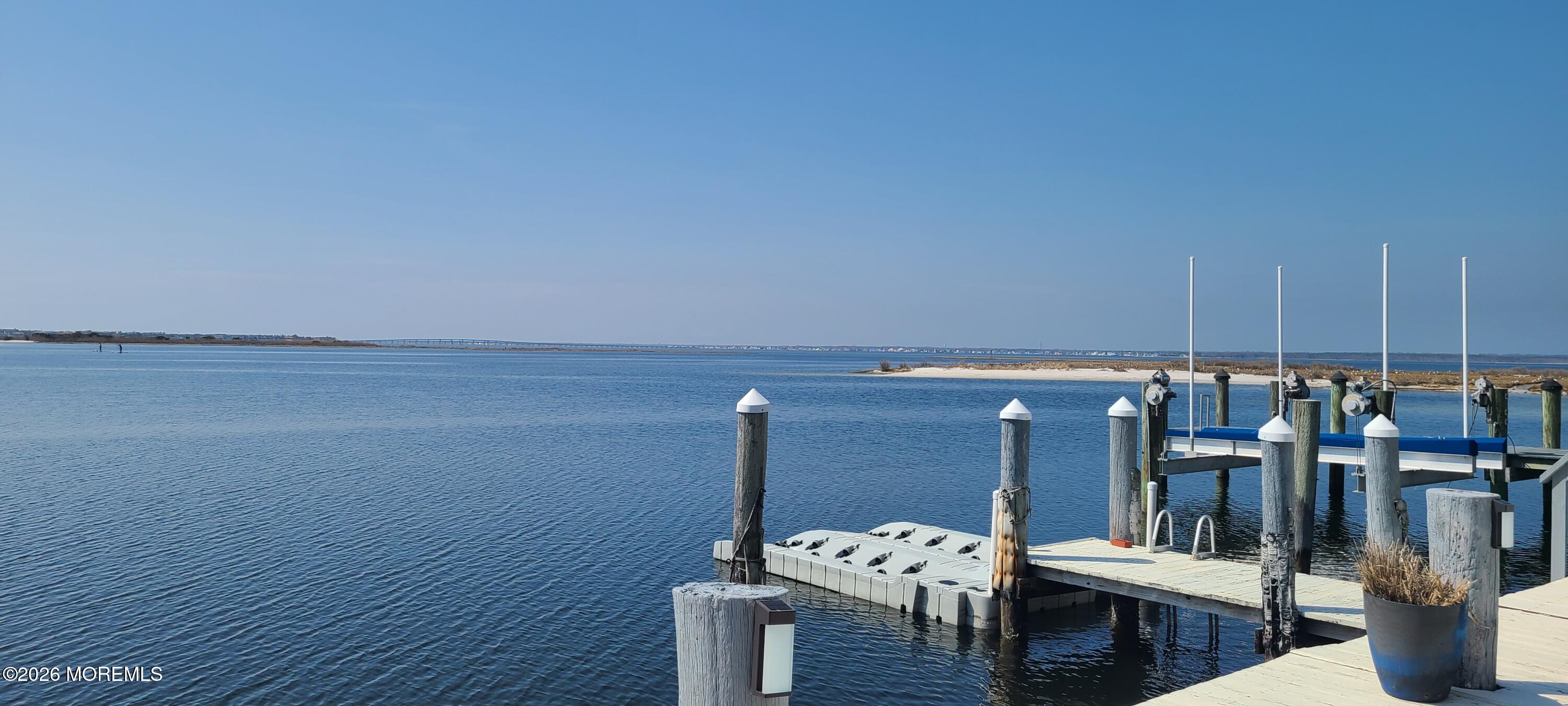 259 Joseph Street Lavallette, NJ 08735 - Photo 8 of 26 a view of a terrace with furniture and potted plants