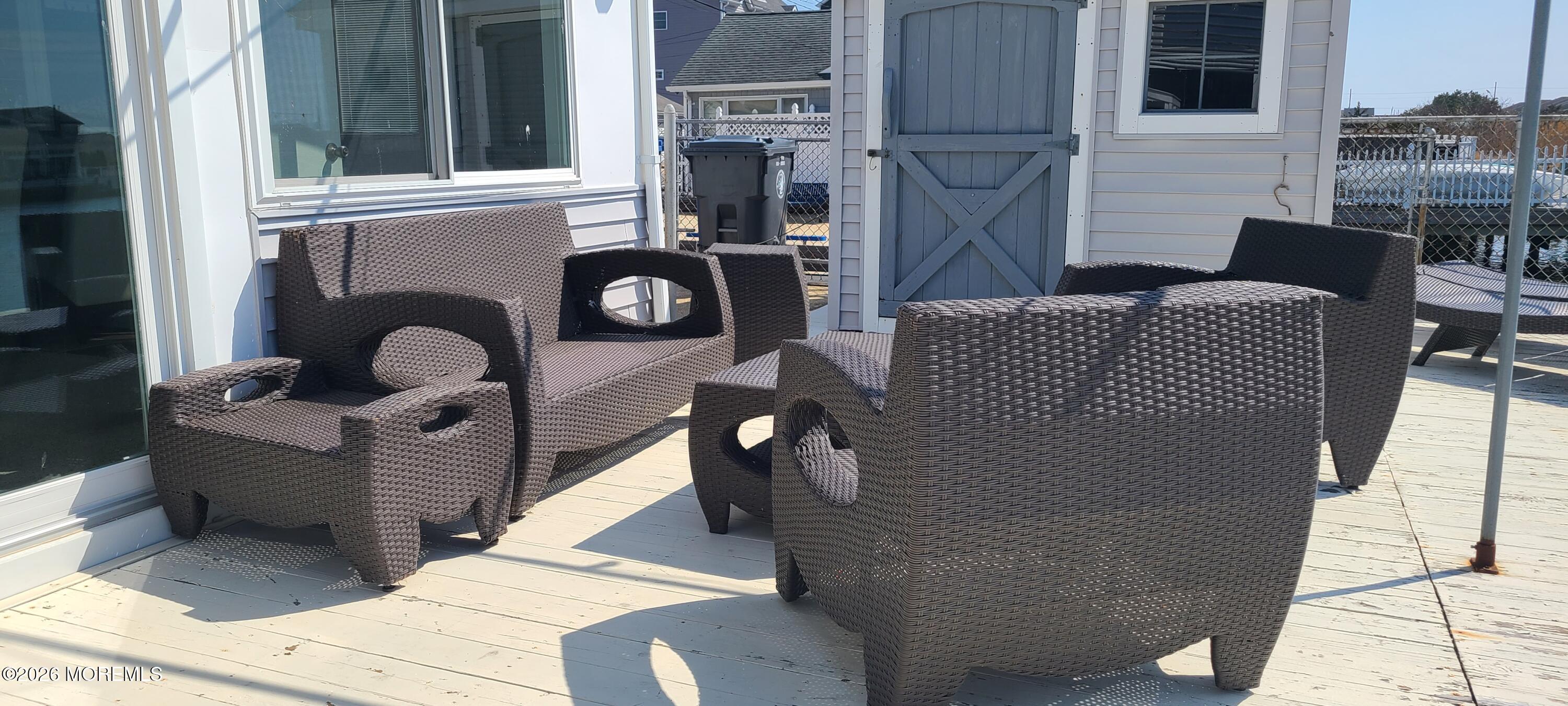 259 Joseph Street Lavallette, NJ 08735 - Photo 10 of 26 a living room with furniture and a fireplace