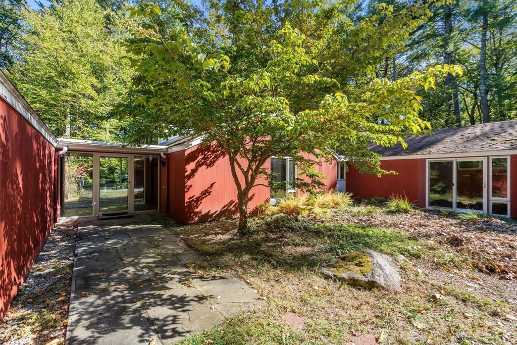60 Baker Bridge Road Lincoln, MA 01773 - Photo 29 of 38 a house view with a backyard space