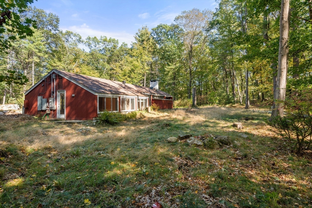 60 Baker Bridge Road Lincoln, MA 01773 - Photo 31 of 38 a view of a house with a yard