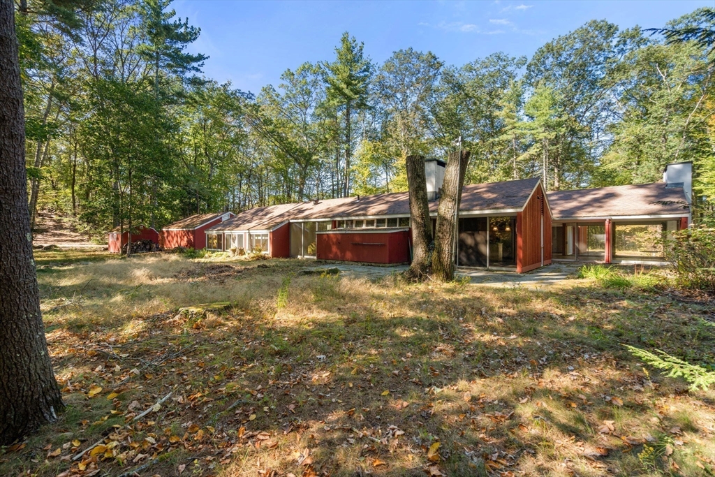 60 Baker Bridge Road Lincoln, MA 01773 - Photo 32 of 38 a view of a house with a yard
