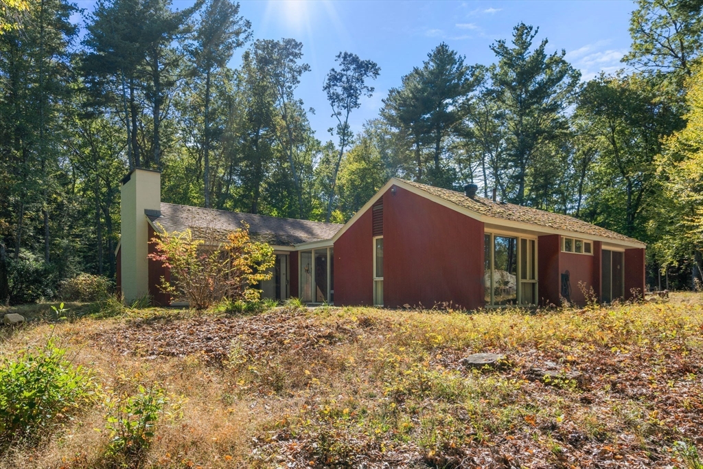 60 Baker Bridge Road Lincoln, MA 01773 - Photo 33 of 38 a view of a house with a yard