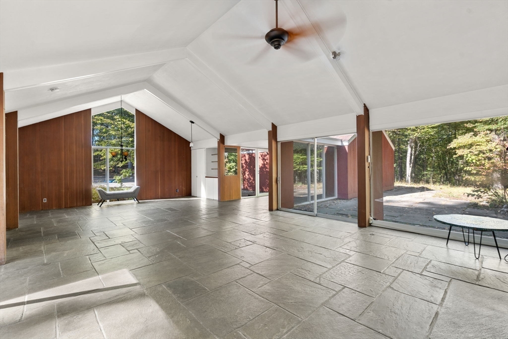 60 Baker Bridge Road Lincoln, MA 01773 - Photo 5 of 38 a view of an entryway with a chandelier