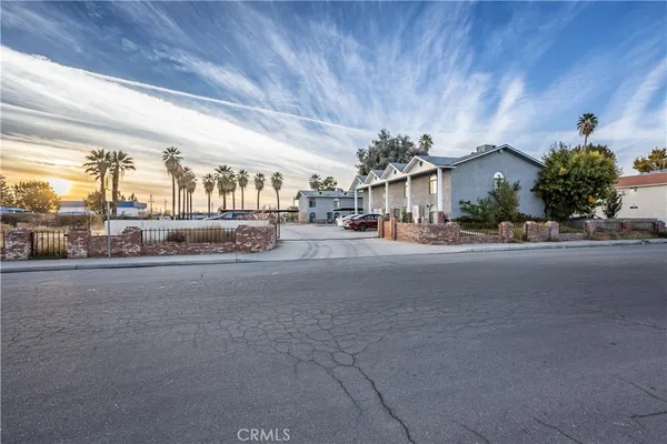 a view of a street in front of a building