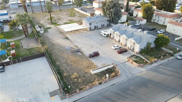 an aerial view of residential house with outdoor space