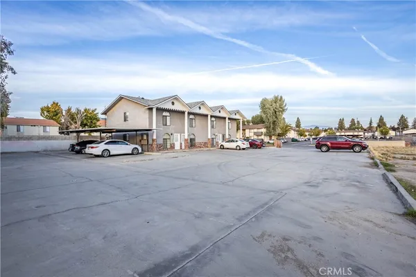 a view of a street with cars