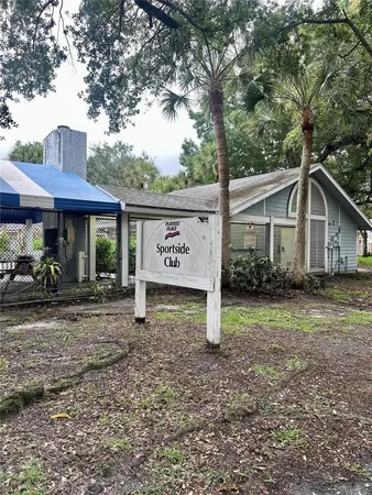 a front view of a house with a small yard