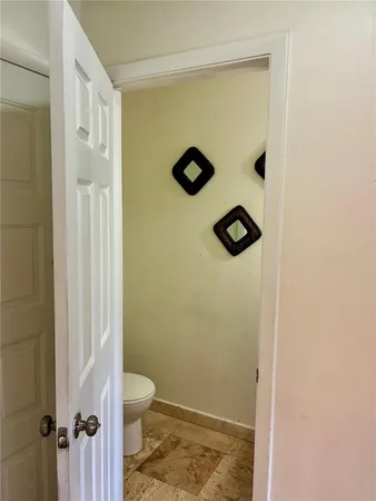 a bathroom with a toilet