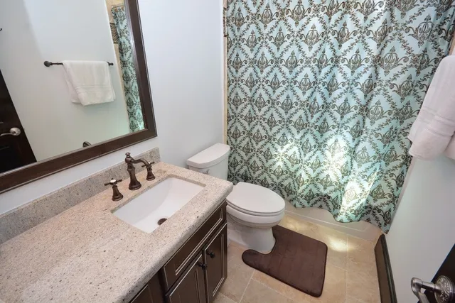 a workspace with furniture and a window