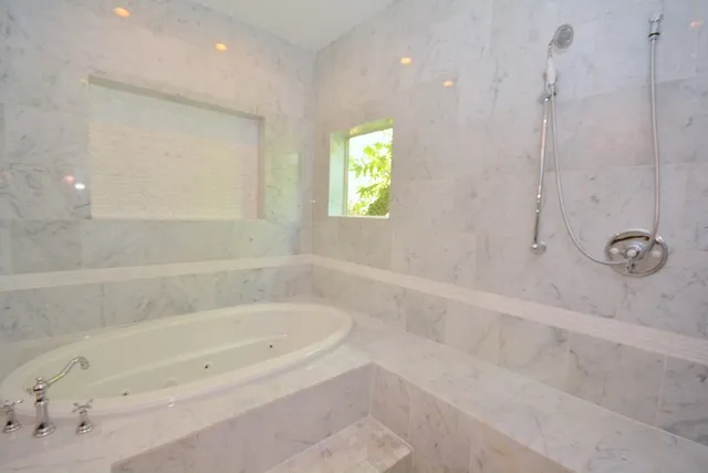a view of a bathroom with a tub