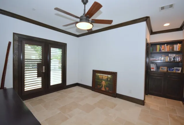 an empty room with bookshelf