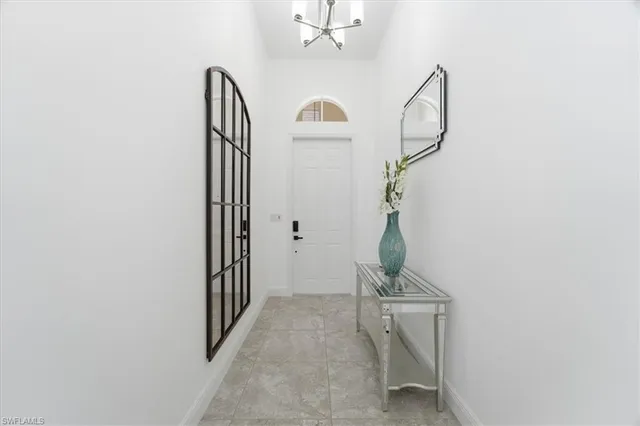 a view of a hallway with staircase