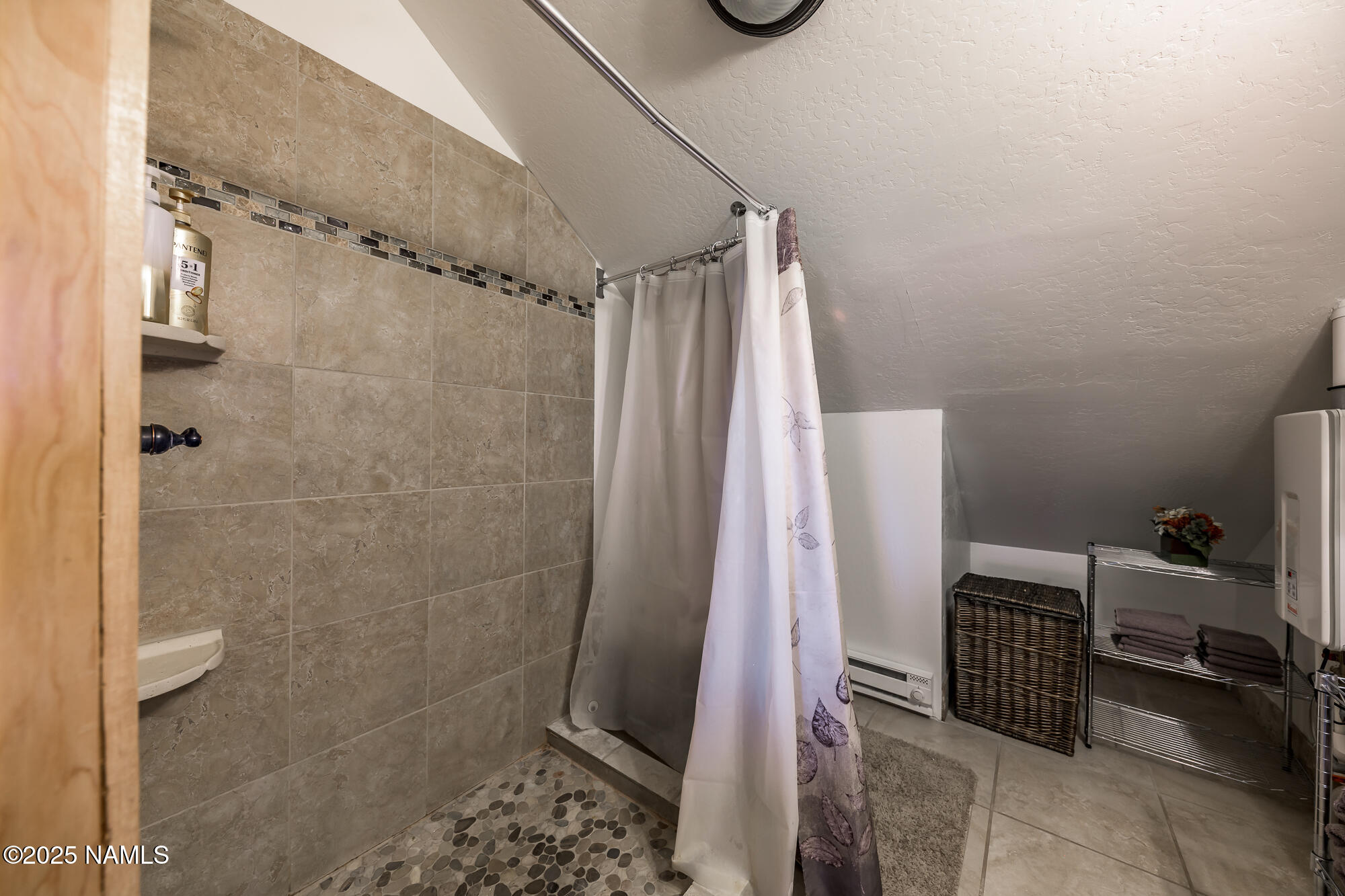 224 East San Marcos Road Williams, AZ 86046 - Photo 35 of 58 a bathroom with a shower
