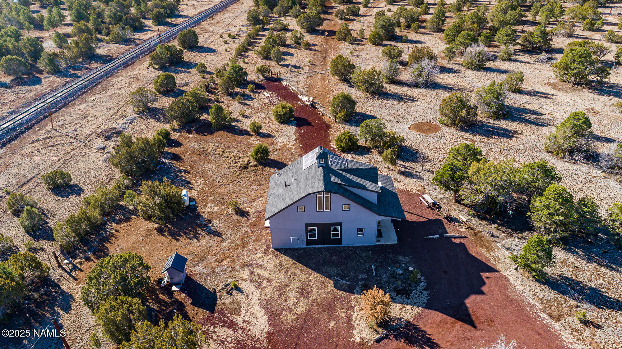 224 East San Marcos Road Williams, AZ 86046 - Photo 38 of 58 an aerial view of house with yard