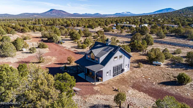 a view of a house with a mountain
