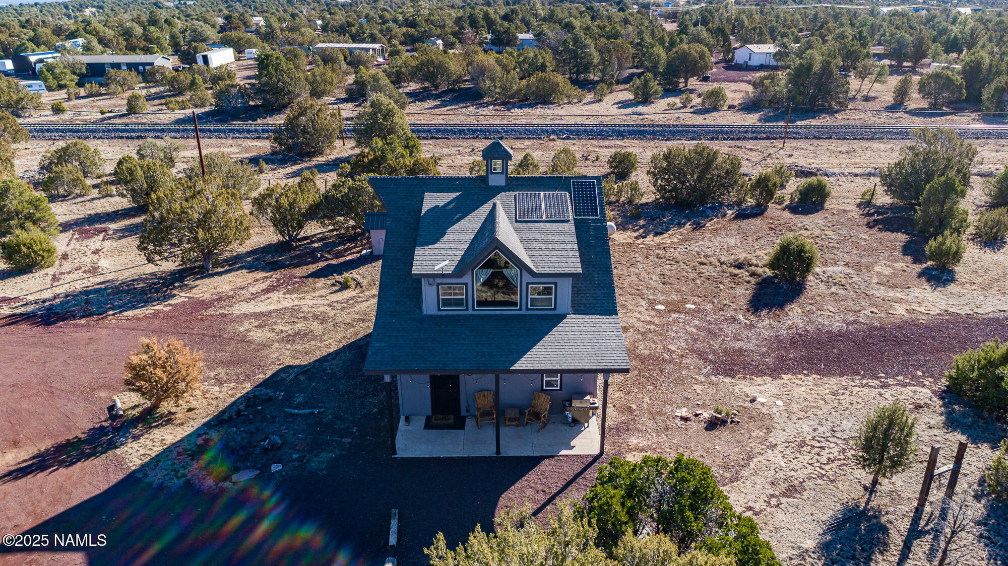 224 East San Marcos Road Williams, AZ 86046 - Photo 40 of 58 a view of a chairs and table on the wooden floor