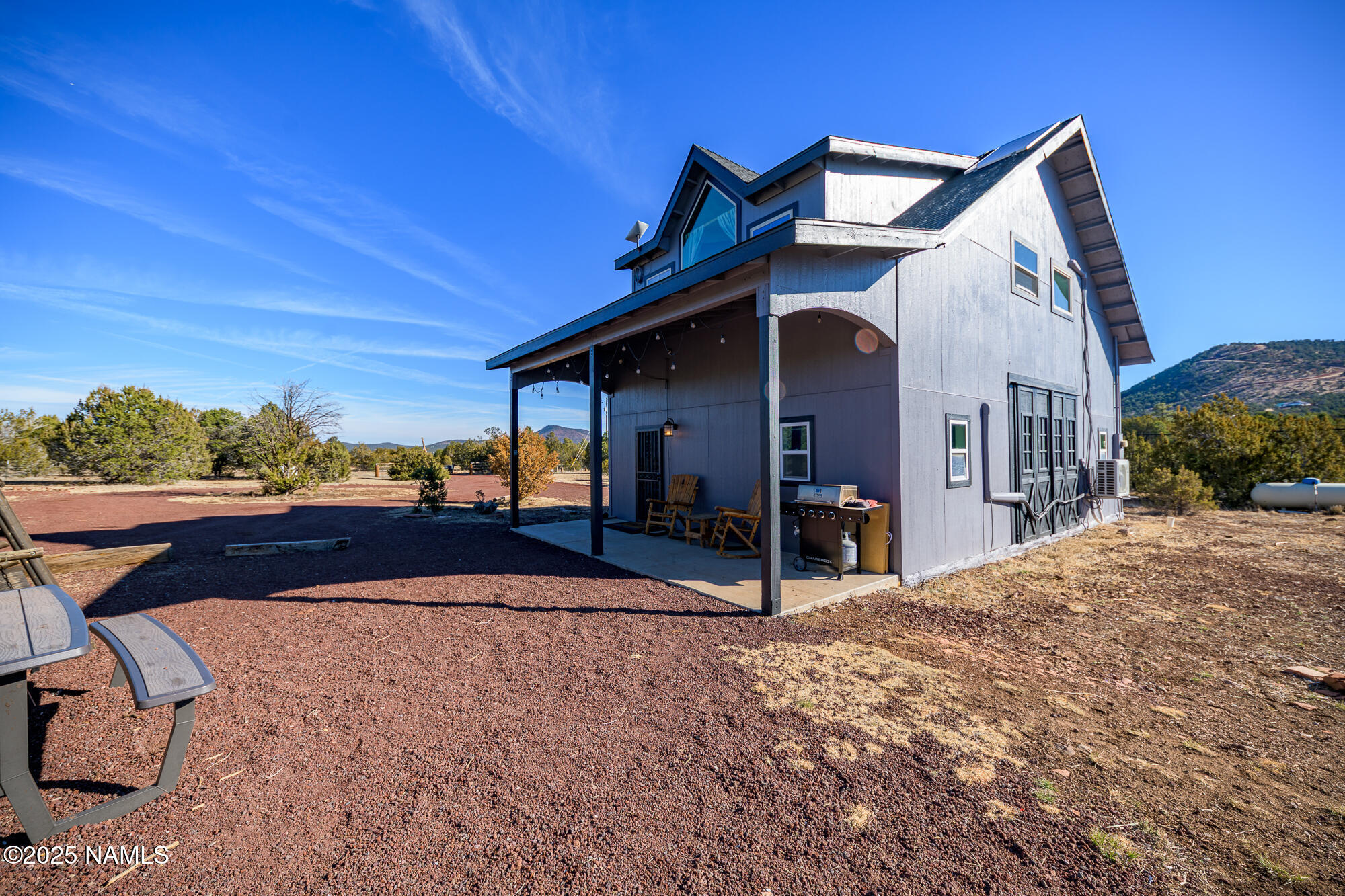 224 East San Marcos Road Williams, AZ 86046 - Photo 4 of 58 a view of a house with a yard
