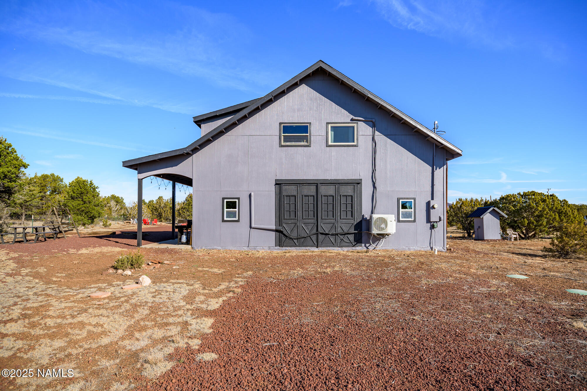 224 East San Marcos Road Williams, AZ 86046 - Photo 46 of 58 a view of a house with a patio