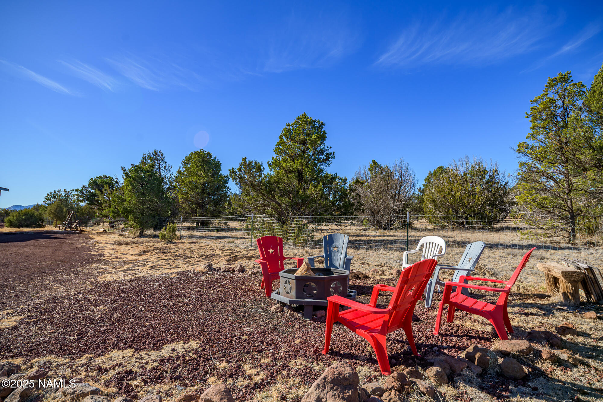 224 East San Marcos Road Williams, AZ 86046 - Photo 50 of 58 a view of a wooden deck with a yard