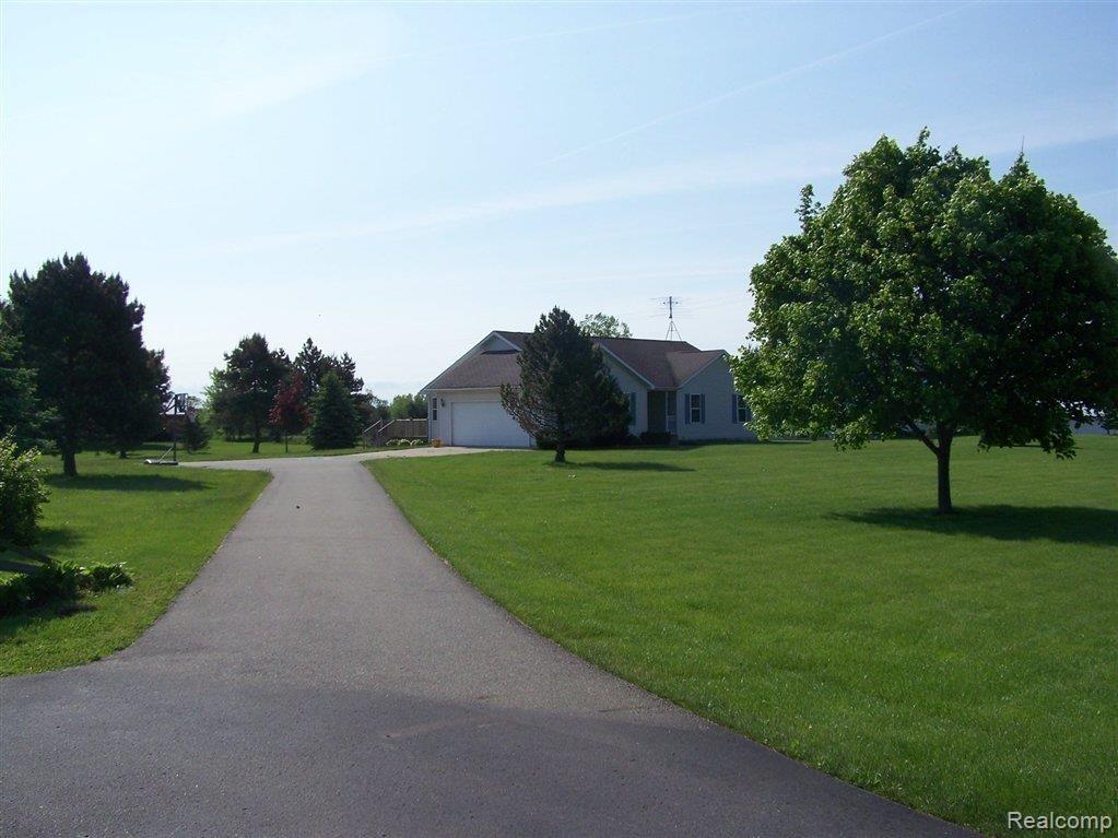 7184 North Fowlerville Road Fowlerville, MI 48836 - Photo 6 of 6 PAVED DRIVE TO HOUSE! GOOD BYE!