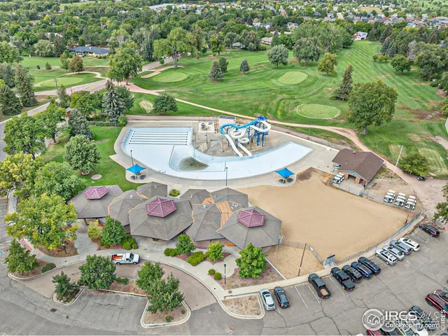 an outdoor space with furniture and garden