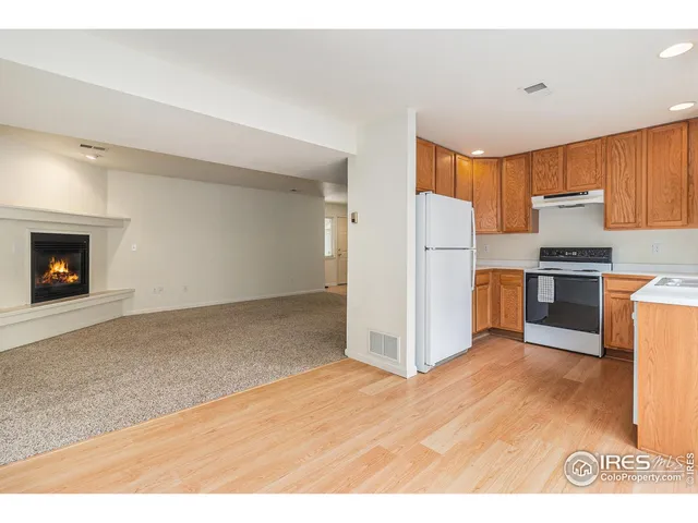 a view of kitchen with wooden floor