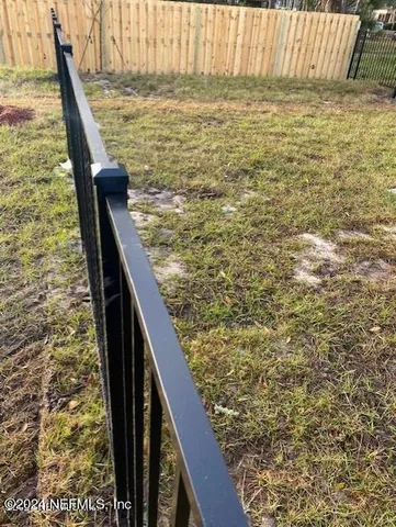a view of balcony with furniture