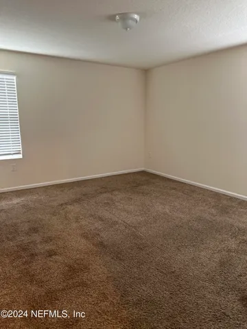 an empty room with a natural light