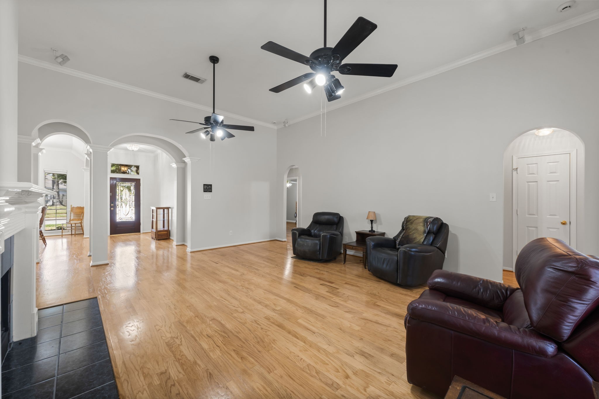 1614 Mercoal Drive Spring, TX 77386 - Photo 13 of 50 Designed for togetherness, the open living space allows family to connect and move freely between dining, cooking, and relaxing areas.