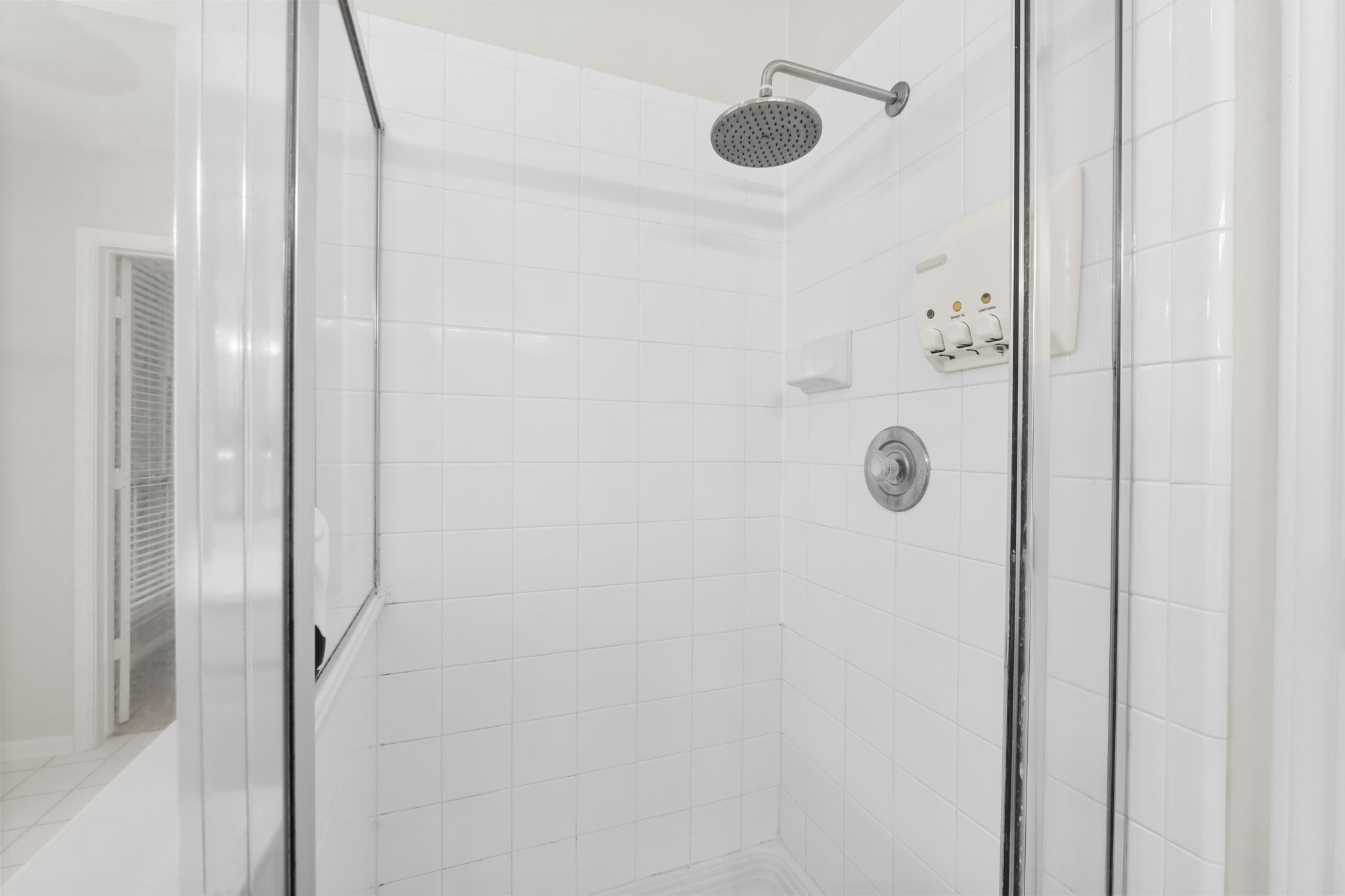 1614 Mercoal Drive Spring, TX 77386 - Photo 28 of 50 Enjoy a spa-inspired shower with a rainfall showerhead that envelops you in a relaxing, even flow of water.