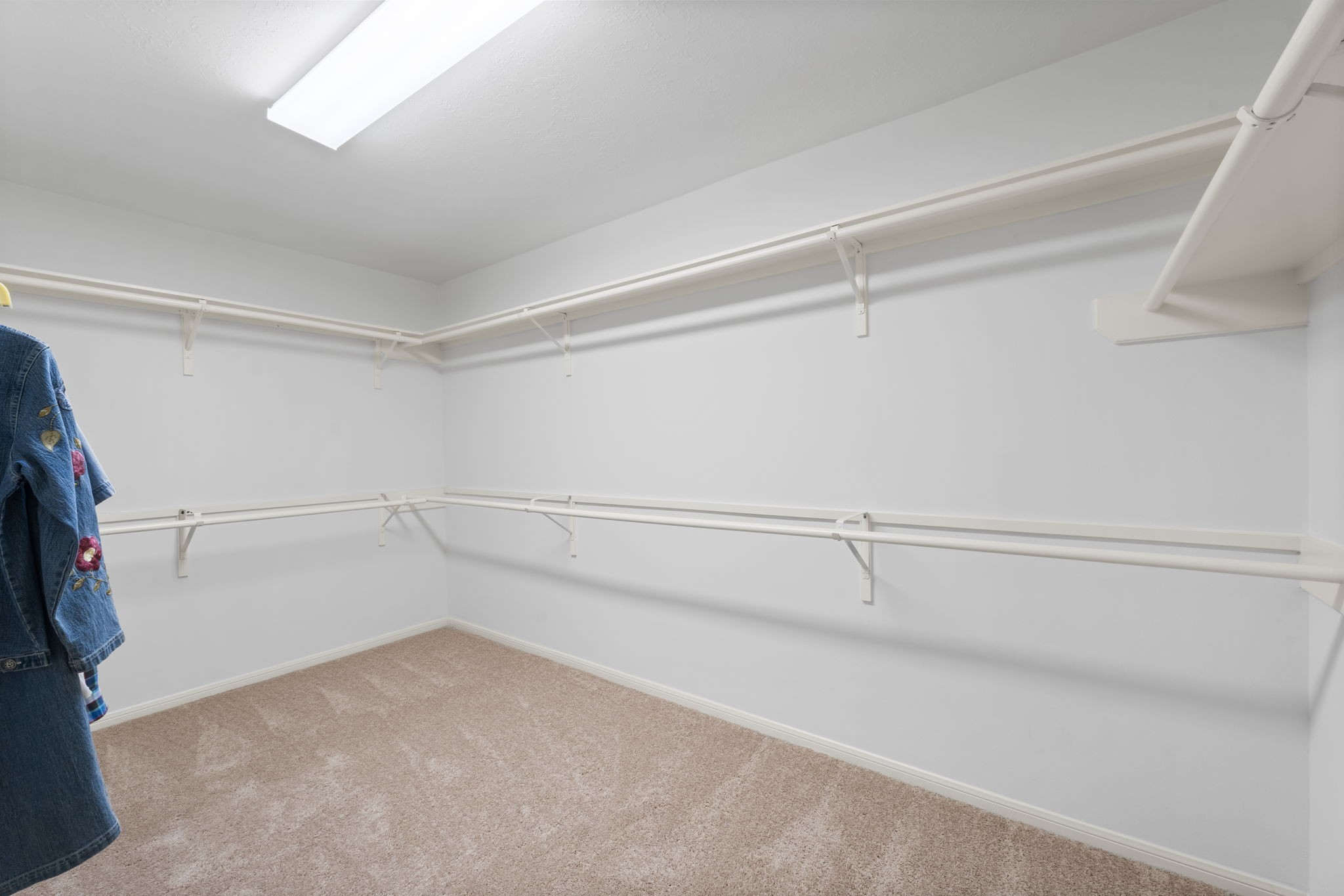 1614 Mercoal Drive Spring, TX 77386 - Photo 29 of 50 This large walk-in closet off of the primary bath provides generous storage and feels more expansive in person than pictures can capture.