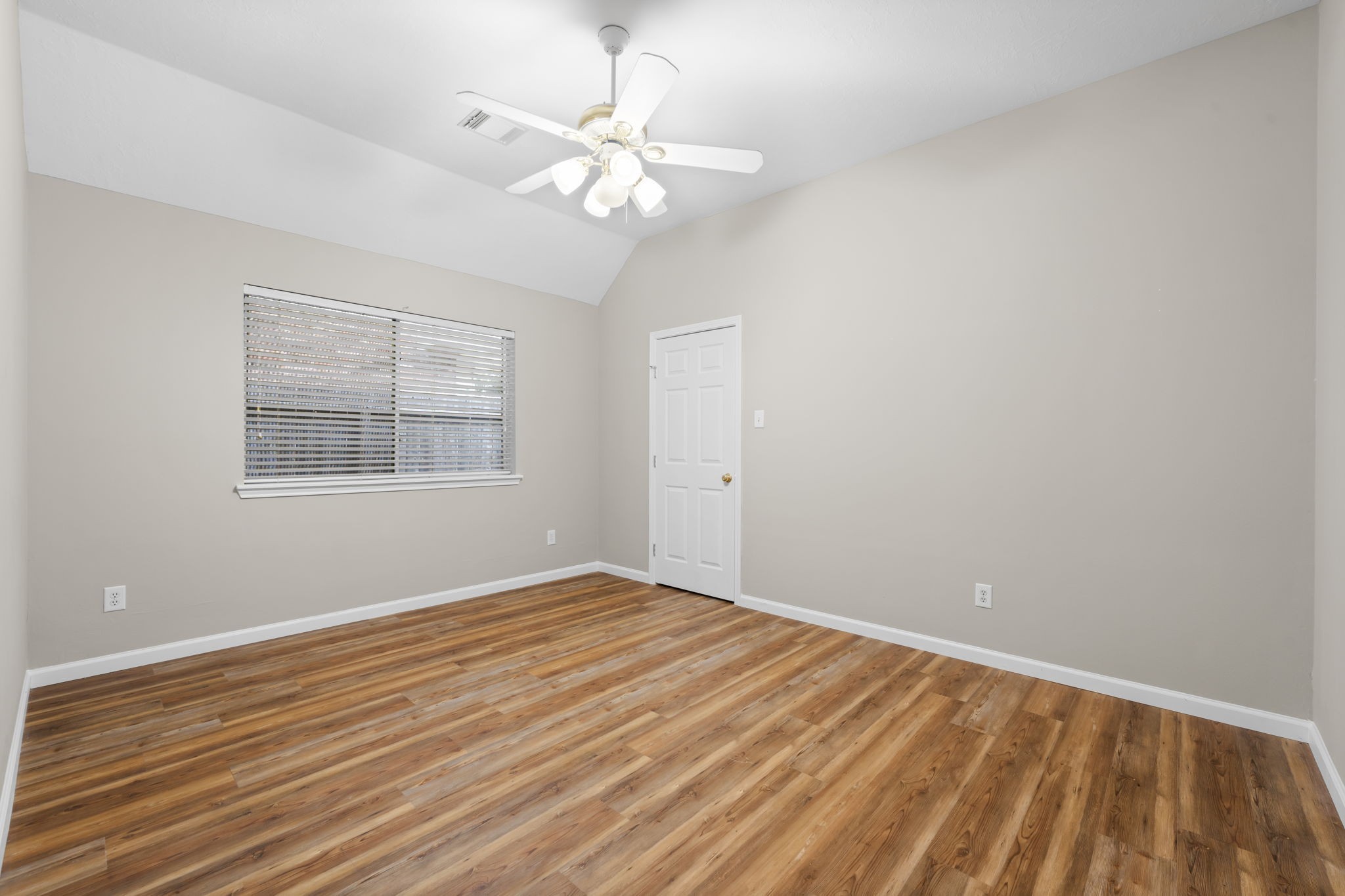 1614 Mercoal Drive Spring, TX 77386 - Photo 30 of 50 This roomy guest space boasts wood floors and plenty of light, creating a comfortable setting for family or friends.