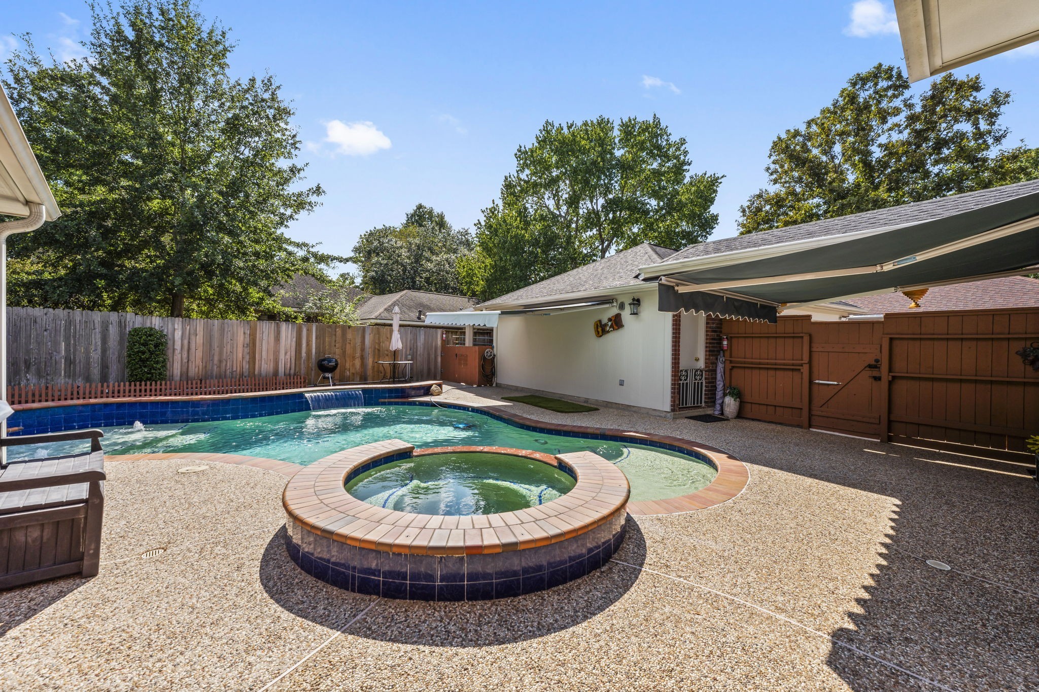 1614 Mercoal Drive Spring, TX 77386 - Photo 39 of 50 Enjoy the therapeutic benefits of the spa, where warm, bubbling water and gentle jets create a calming environment that supports relaxation and well-being.