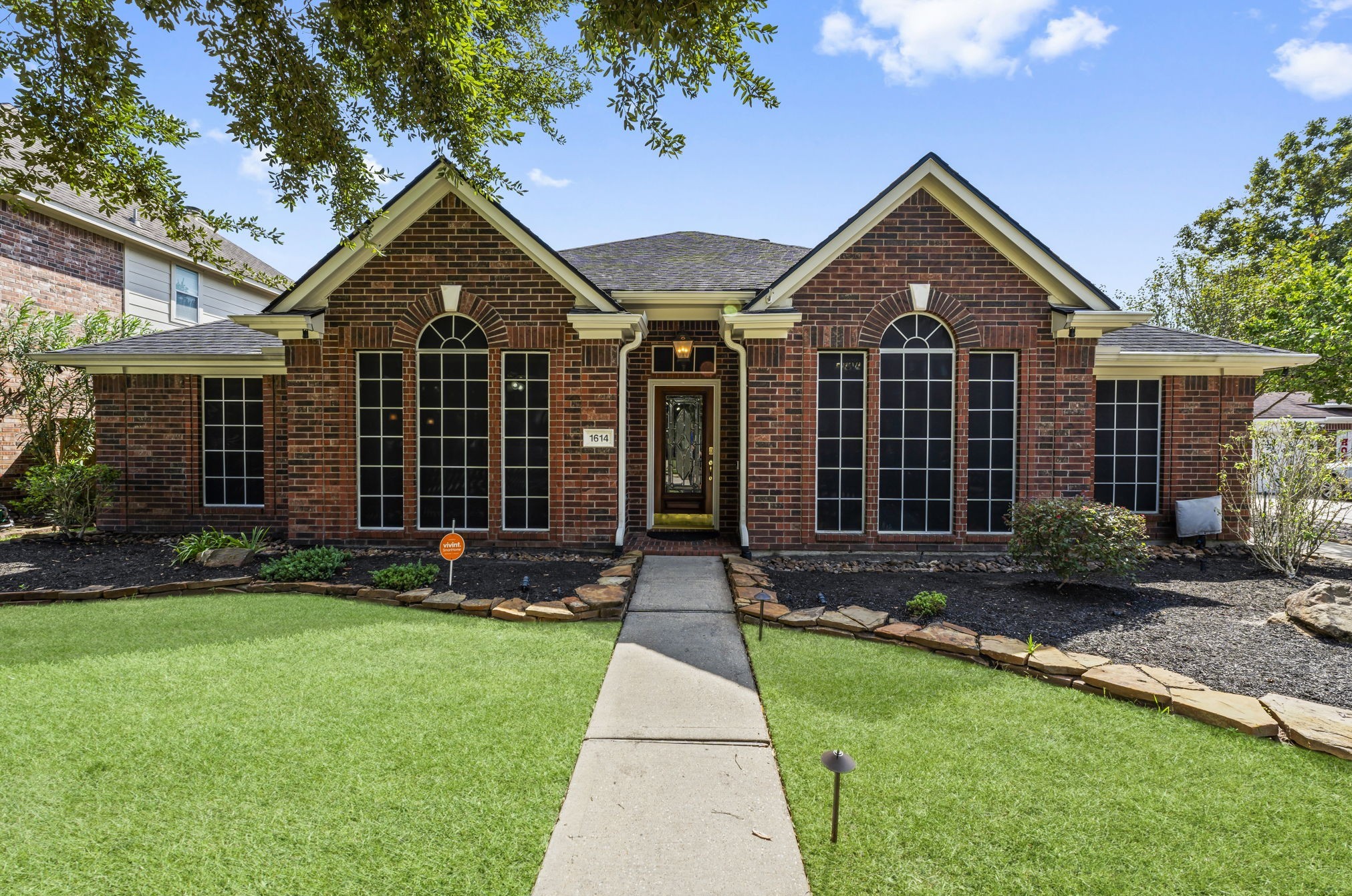 1614 Mercoal Drive Spring, TX 77386 - Photo 5 of 50 From the moment you walk in, enjoy light-filled rooms and effortless flow from the 2 living areas to your poolside retreat. Let's go check it out!