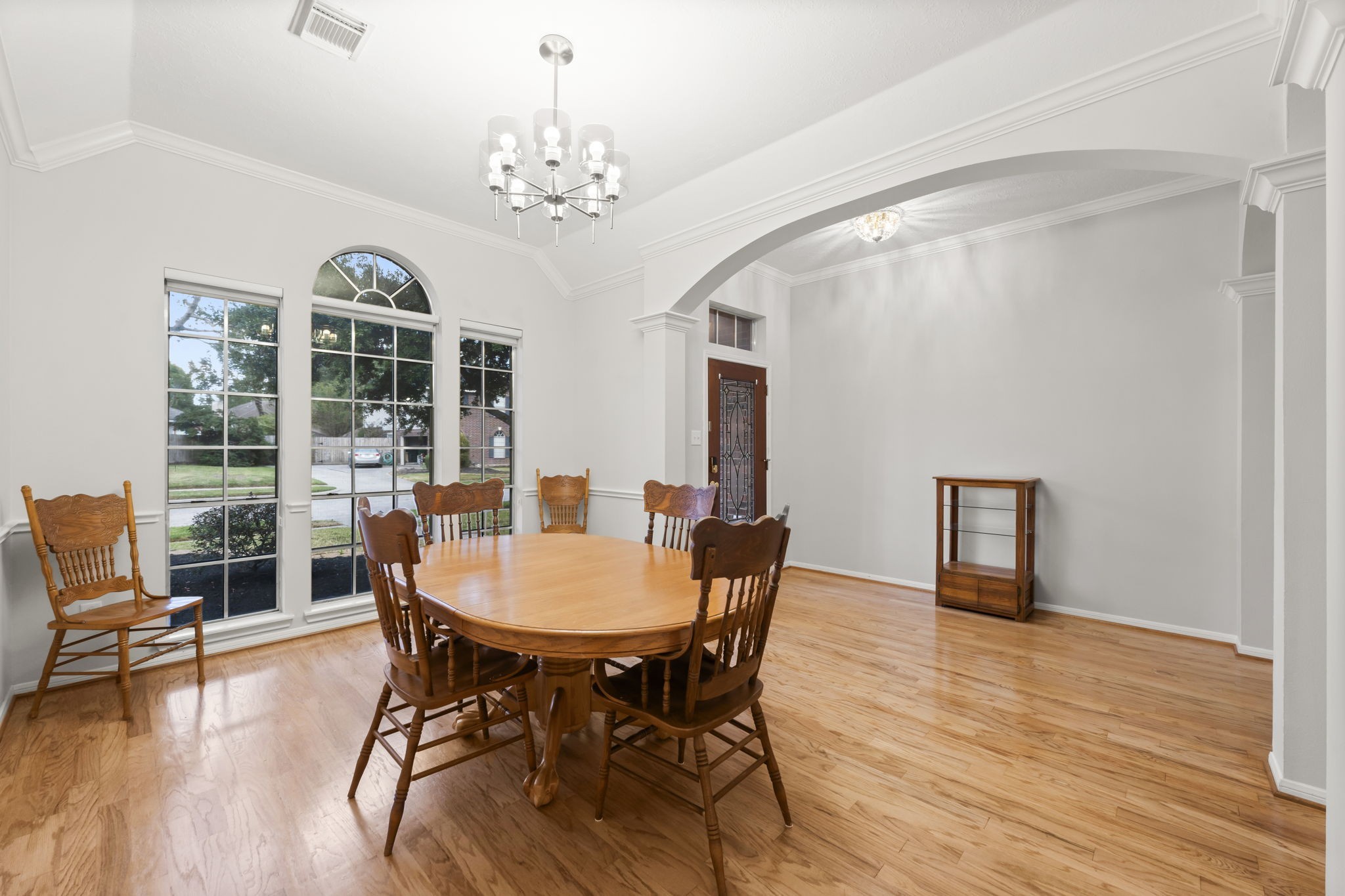 1614 Mercoal Drive Spring, TX 77386 - Photo 9 of 50 The spacious dining room invites family and friends to gather, share meals, and create lasting memories in a warm, welcoming setting.