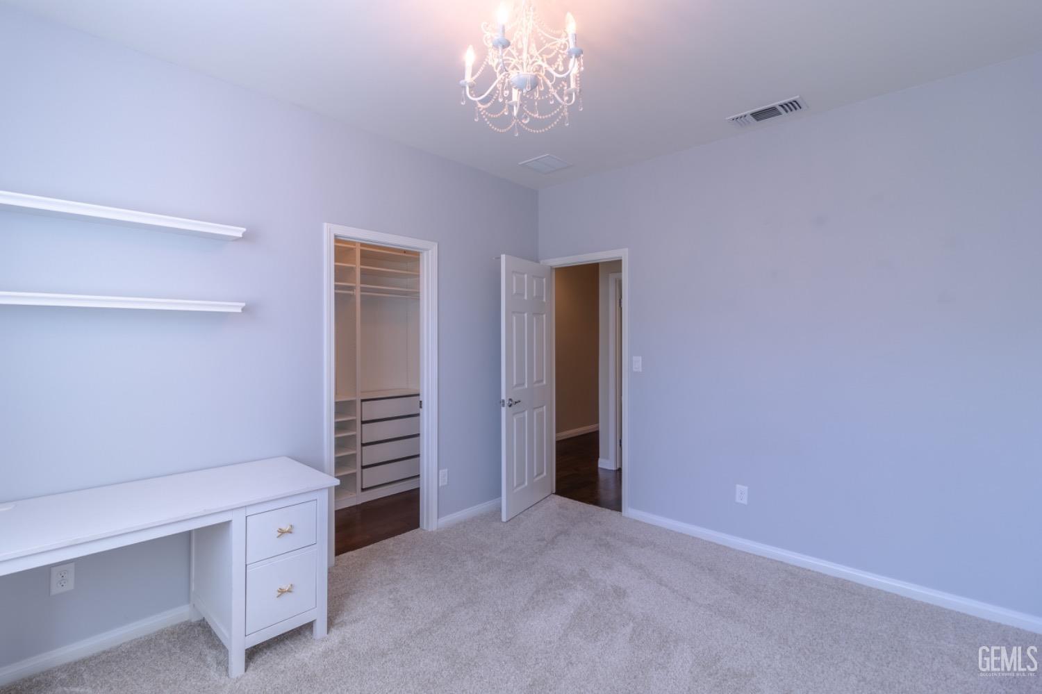 Undisclosed Address Bakersfield, CA 93314 - Photo 26 of 47 a view of an empty room with a window