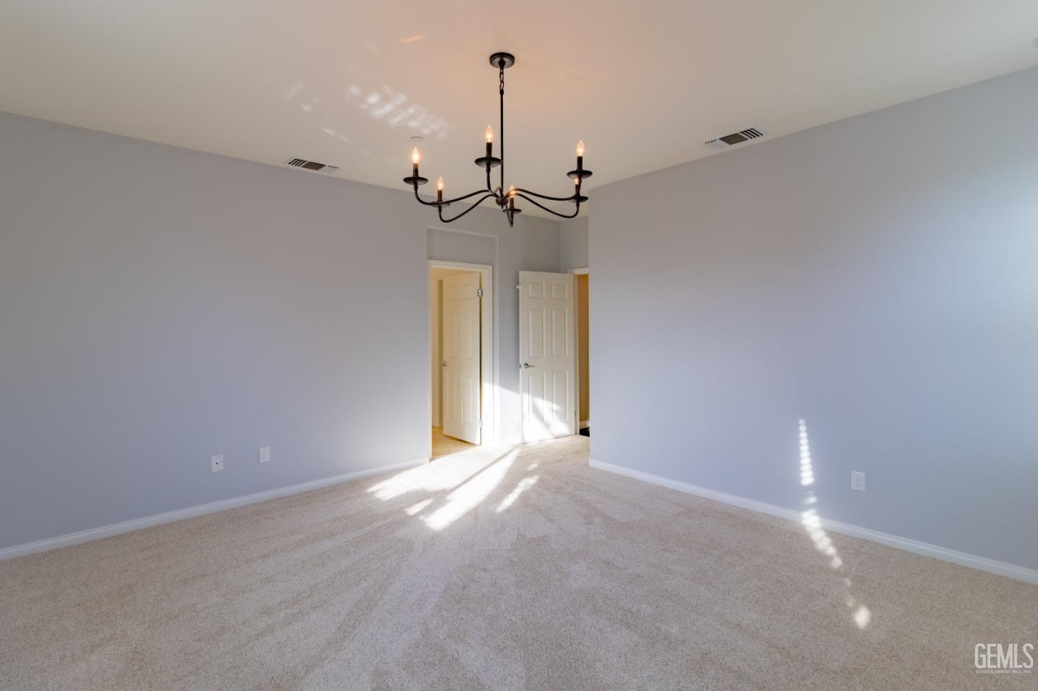 Undisclosed Address Bakersfield, CA 93314 - Photo 31 of 47 a view of a room with a ceiling fan and window