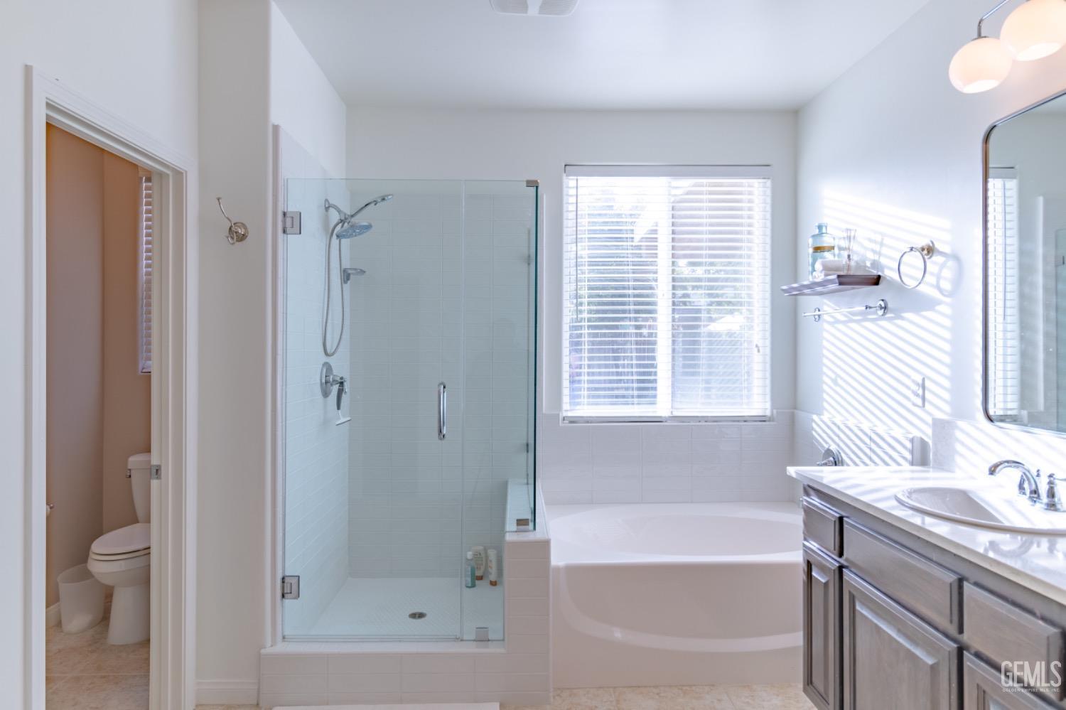 Undisclosed Address Bakersfield, CA 93314 - Photo 38 of 47 a bathroom with a bathtub and a sink