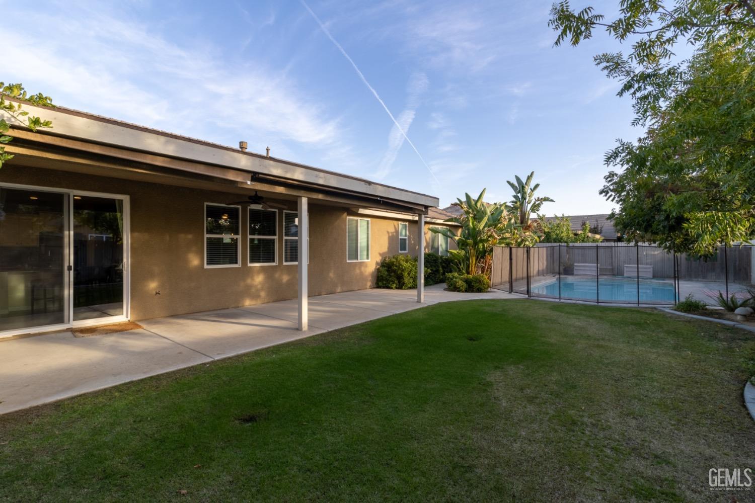 Undisclosed Address Bakersfield, CA 93314 - Photo 40 of 47 a view of an house with backyard space and garden