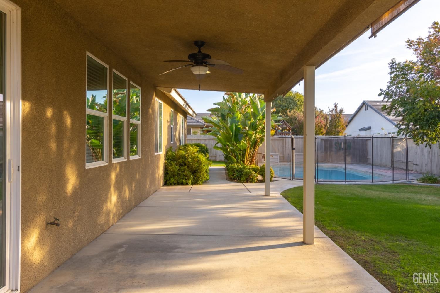 Undisclosed Address Bakersfield, CA 93314 - Photo 41 of 47 a front view of a house with a yard