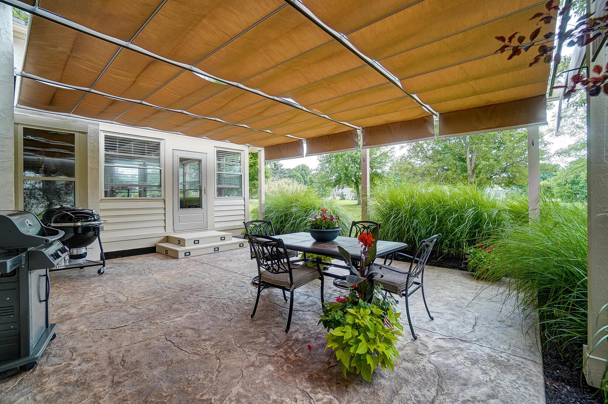 5674 Steward Road Galena, OH 43021 - Photo 5 of 82 Enjoy your evening on the patio while surrounded by your ash landscape that provide you complete privacy