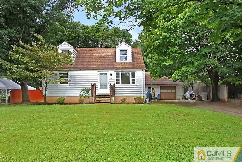 62 Wilson Road Somerset, NJ 08873 - Photo 14 of 14 a front view of a house with a yard
