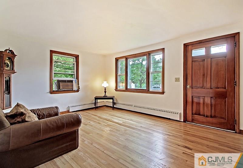 62 Wilson Road Somerset, NJ 08873 - Photo 4 of 14 a living room with furniture and a window